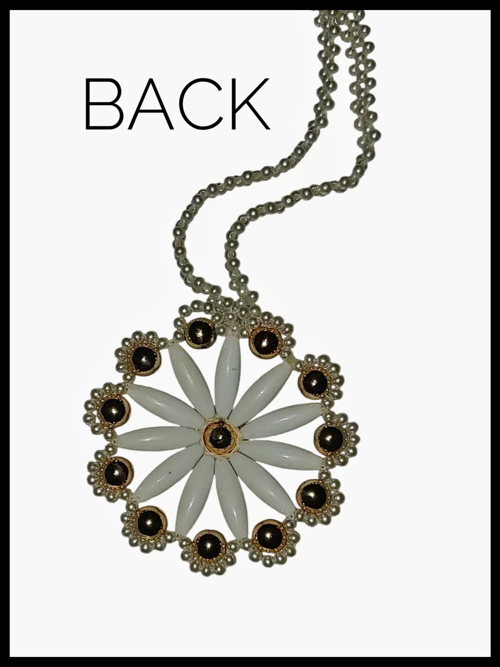 White and Gold Tone Floral Pendant Necklace